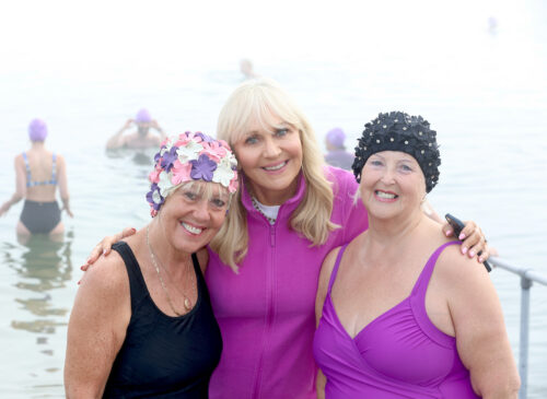 NO REPRO FEE 19/09/2024 Dublin, Ireland. Broadcaster Miriam O’Callaghan joins Caroline Murray, Miriam Nolan, and a band of sea swimmers at Seapoint, South Dublin to mark World GO (Gynaecological Oncology) Day,  Friday, 20th September at Seapoint.  The Irish Network of Gynaecological Oncologists (INGO) is encouraging women to ‘Dip or Dance’  this September by either taking the plunge or having a bop as they join patients and advocates around the globe to raise awareness about all five gynaecological cancers (vulval, vaginal, cervical, uterine and ovarian) and their risk factors, and to combat the stigma associated with gynaecological cancer. Photograph: Leon Farrell / Photocall Ireland